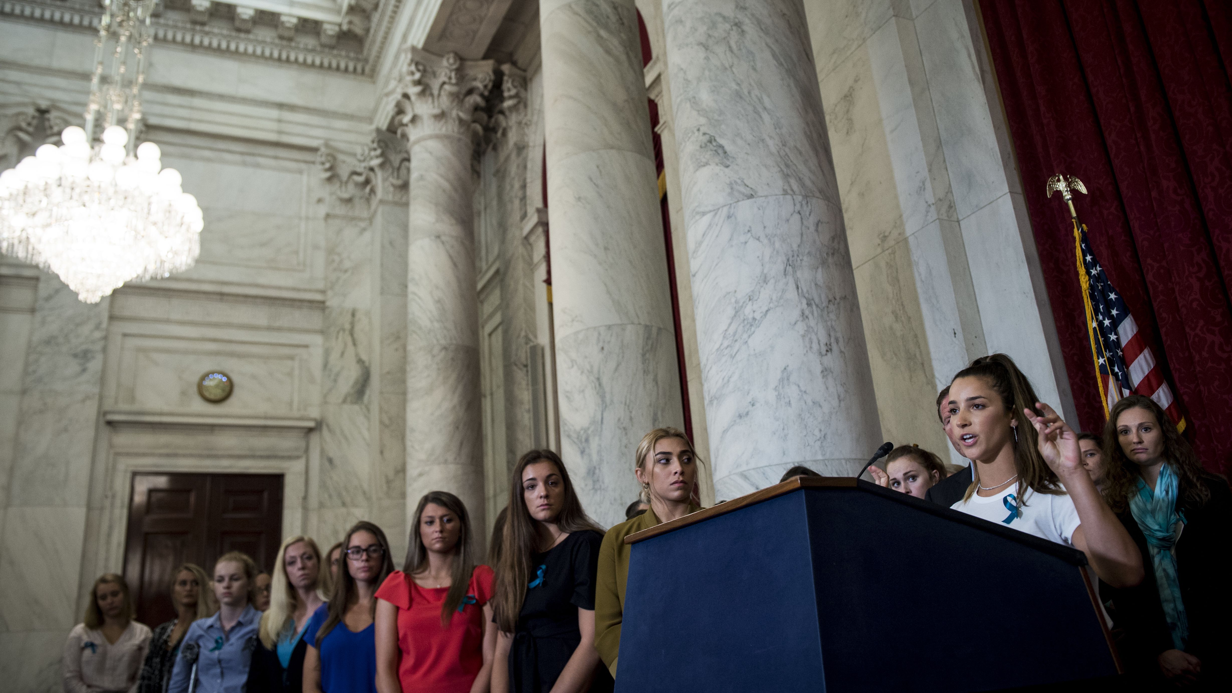 Olympic gold medalist in gymnastics and survivor of sexual abuse by Larry Nassar Aly Raisman speaks during a press conference in the Kennedy Caucus Room in the Russell Senate Office Building on July 24, 2018. Over 60 victims were joined by Senate Democrats to discuss ways to prevent further abuse.