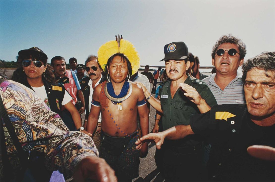 Paiakan pictured with Brazilian police in 1992.