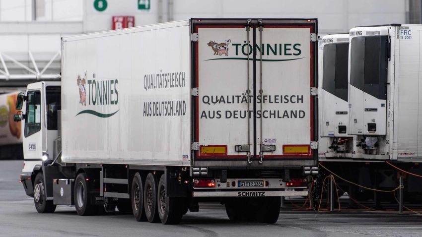 RHEDA-WIEDENBRUECK, GERMANY - JUNE 17: Trucks stand at the Toennies meat packing plant during the coronavirus pandemic in Rheda-Wiedenbrueck on June 17, 2020 near Guetersloh, Germany. Authorities announced today that schools and child day care centers in the region will be shut temporarily following a dramatic increase in the number of confirmed Covid-19 infections among workers at the Toennies plant. A total of 415 infected workers have been confirmed, with the number likely to rise as further test results become available. According to media reports 7,000 people are in quarantine. (Photo by Lukas Schulze/Getty Images)