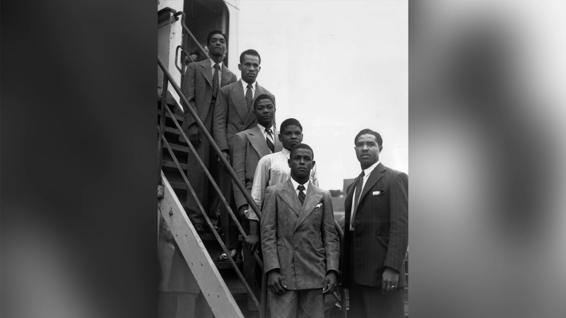 From the top, hopeful Jamaican boxers Charles Smith, Ten Ansel, Essi Reid, John Hazel, Boy Solas and manager Mortimer Martin arrive at Tilbury on the Empire Windrush.
