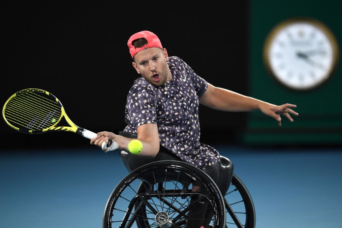 Dylan Alcott hits a return during the men's wheelchair singles final at the Australian Open.