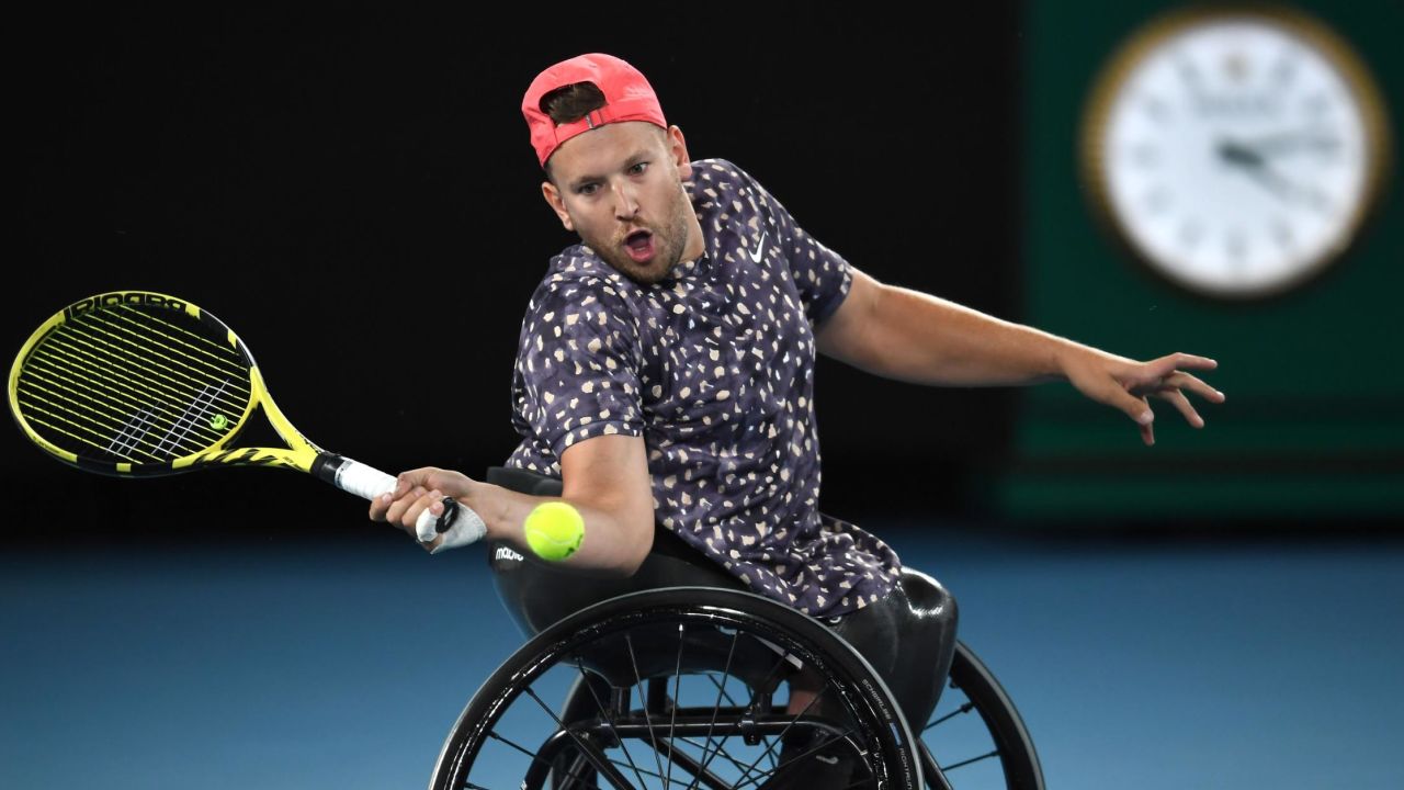 Dylan Alcott hits a return during the men's wheelchair singles final at the Australian Open.
