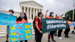 Deferred Action for Childhood Arrivals (DACA) students celebrate in front of the U.S. Supreme Court after the Supreme Court rejects President Donald Trump's bid to end legal protections for young immigrants, Thursday, June 18, 2020, in Washington.