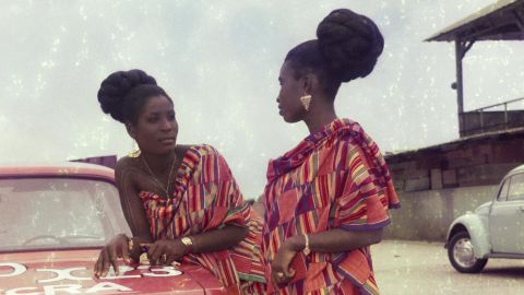 Untitled #2, Two friends dress for church celebration, Accra, 1970s