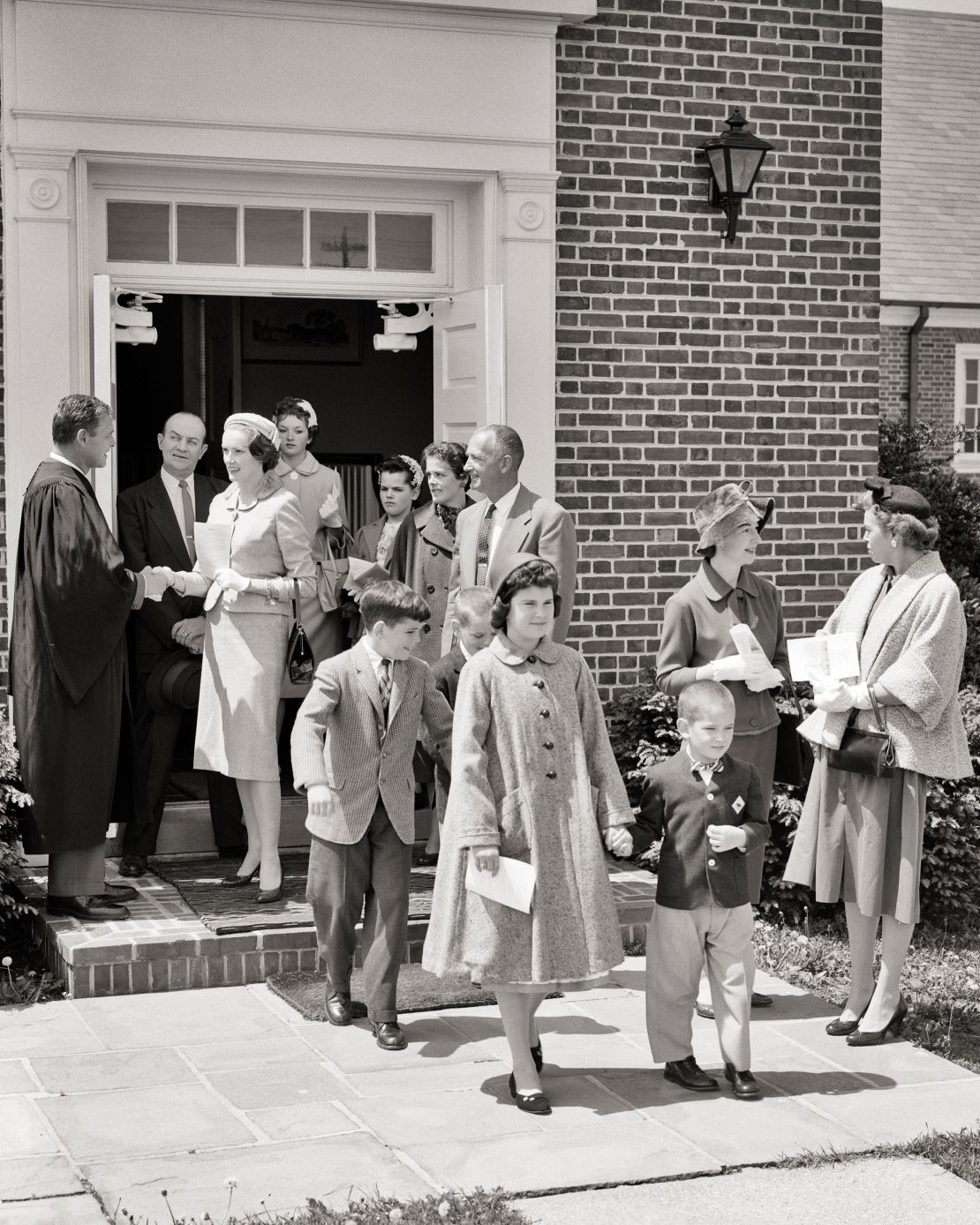 Worshipers leaving an American church in the 1950s. "If you read sermons in Mississippi in the 1950s and 1960s you would have no idea that there was a civil rights movement," Jones says.