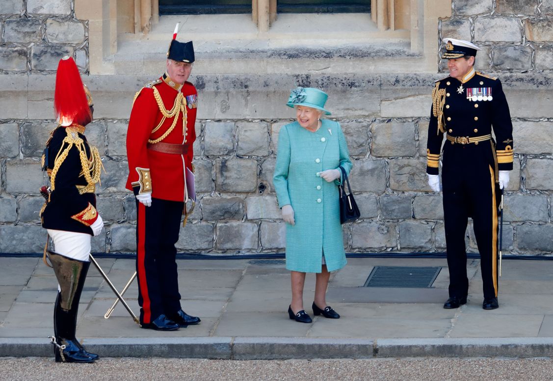 Britain's Queen Elizabeth II attends a military ceremony in Windsor, England, as part of her birthday celebrations on Saturday, June 13.  The Queen's actual birthday is April 21, but British monarchs <a href="https://www.cnn.com/2020/04/21/uk/queen-two-birthdays-explainer-scli-gbr-intl/index.html" target="_blank">have been having separate public celebrations since the 18th century.</a>