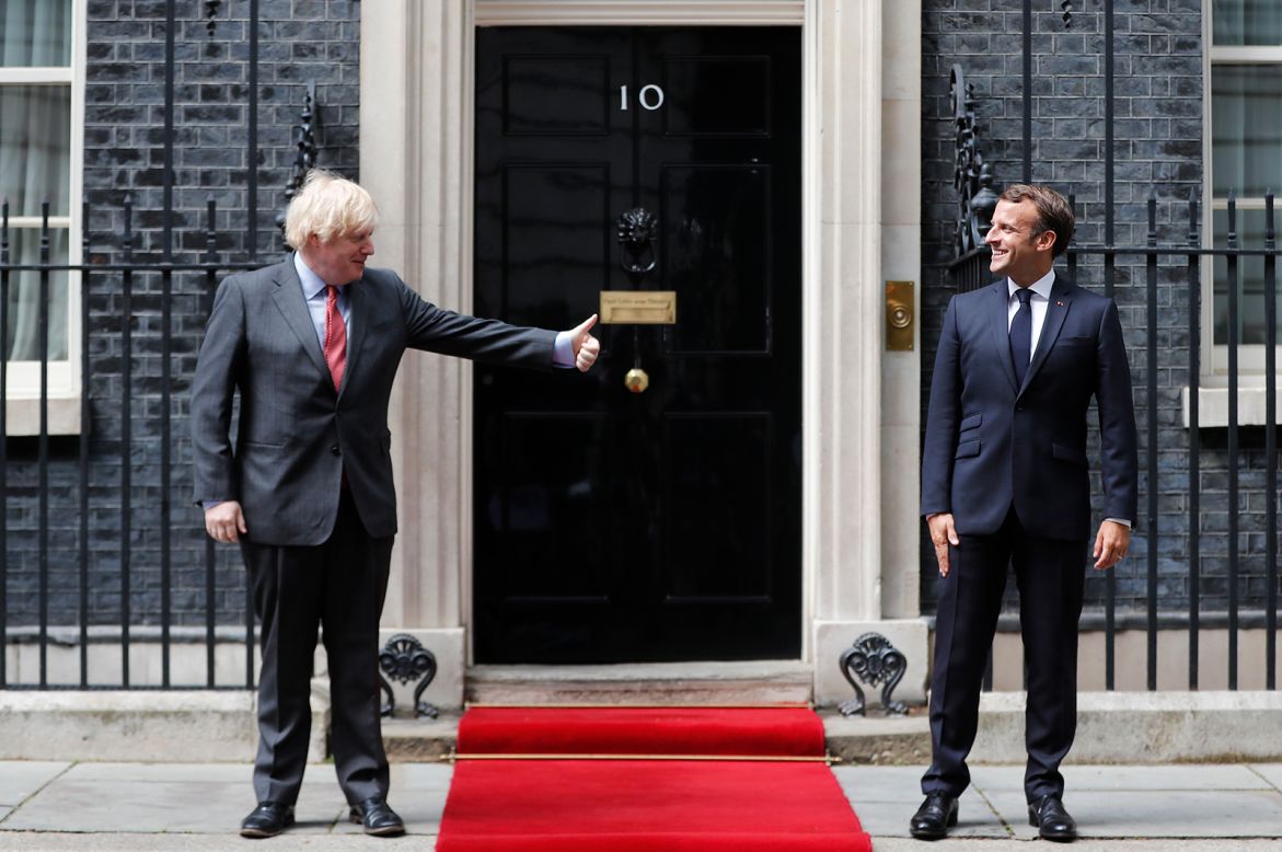 French President Emmanuel Macron, right, is greeted by British Prime Minister Boris Johnson outside No. 10 Downing Street in London on Thursday, June 18. Social-distancing measures were in place during <a href="https://www.cnn.com/2020/06/18/uk/macron-johnson-de-gaulle-speech-london-intl-gbr/index.html" target="_blank">Macron's visit,</a> which marked the 80th anniversary of Charles de Gaulle's broadcast from London to an occupied France during the Second World War. The BBC radio address, known as L'Appel, was a key moment in the French resistance to Nazi occupation.