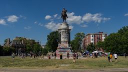 The statue of Confederate General Robert E. Lee on Monument Avenue in Richmond, covered in graffiti following protests over the death of George Floyd. 