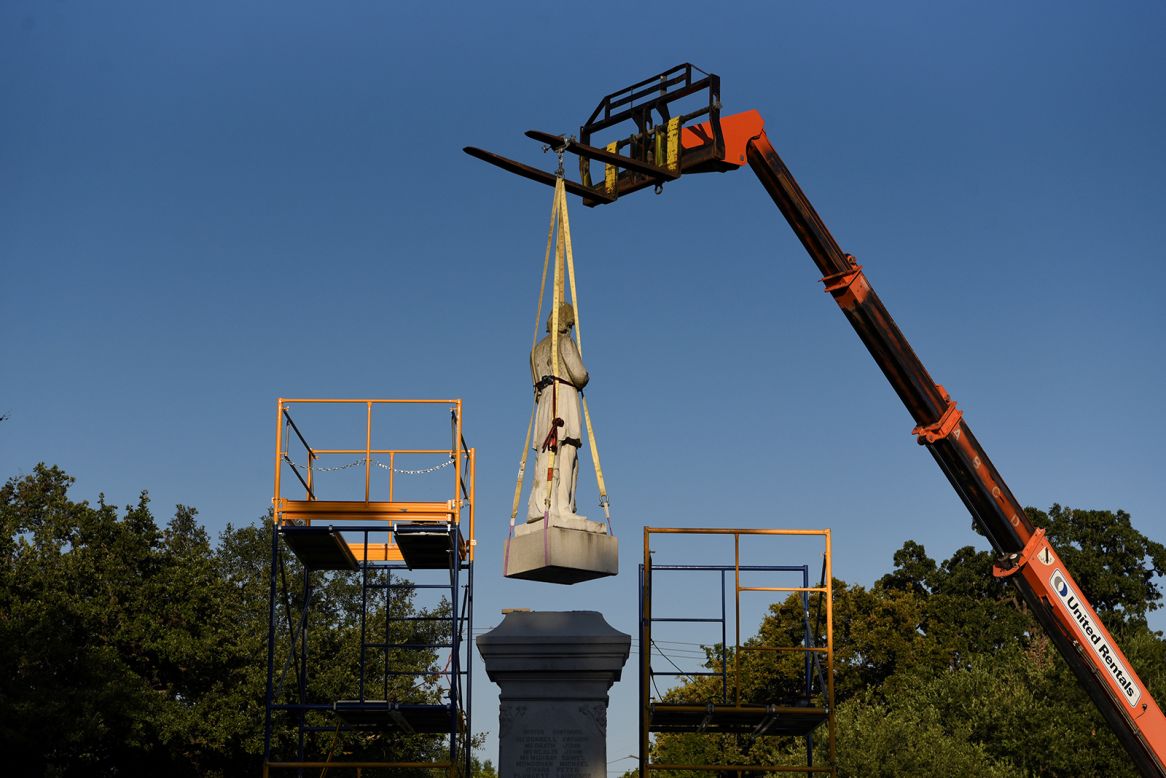 A statue of Confederate Commander Richard W. Dowling is removed in Houston on Wednesday, June 17. <a href="https://www.cnn.com/2020/06/10/us/christopher-columbus-statues-down-trnd/index.html" target="_blank">Confederate statues are being taken down and tampered with</a> across the United States as a racial reckoning occurs following the death of George Floyd.