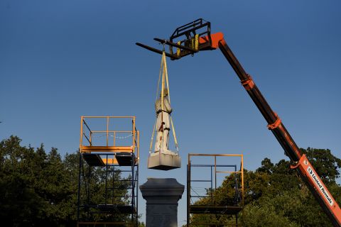 A statue of Confederate Maj. Richard W. Dowling is removed in Houston on June 17. <a href="https://www.cnn.com/2020/06/10/us/christopher-columbus-statues-down-trnd/index.html" target="_blank">Confederate statues are being taken down and tampered with</a> across the United States.
