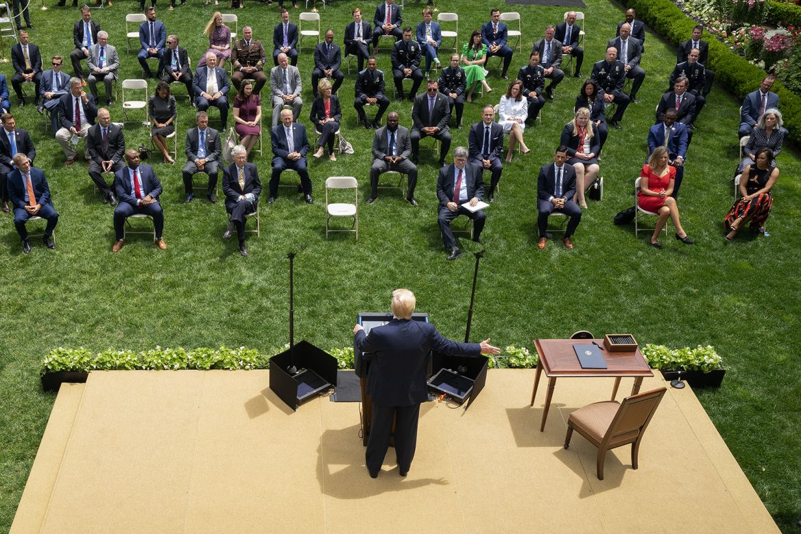 Reporters are spread out as US President Donald Trump speaks in the White House Rose Garden on Tuesday, June 16.