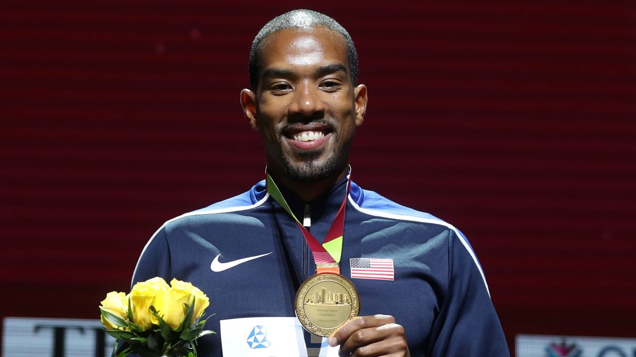 Gold medallist Taylor poses on the podium during the medal ceremony for the Men's Triple Jump at the 2019 IAAF World Athletics Championships.