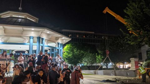 A crane removes a Confederate monument from Decatur Square in Georgia.