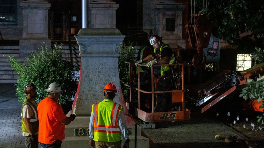 Workers remove a Confederate monument from Decatur square in Georgia on Friday, June 19.