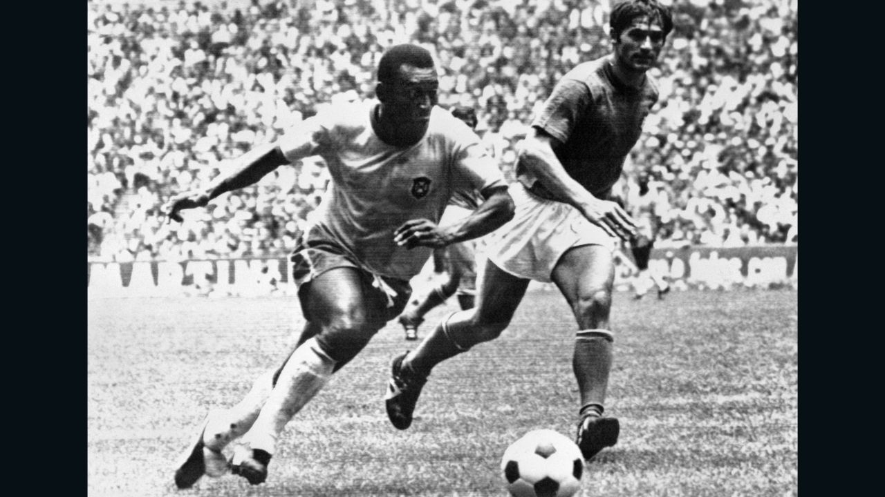 Pelé dribbles past Italian defender Tarcisio Burgnich, who later eulogized about the Brazil star.