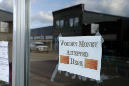 A sign on a business in Tenino, Washington, says they will be accepting wooden money.