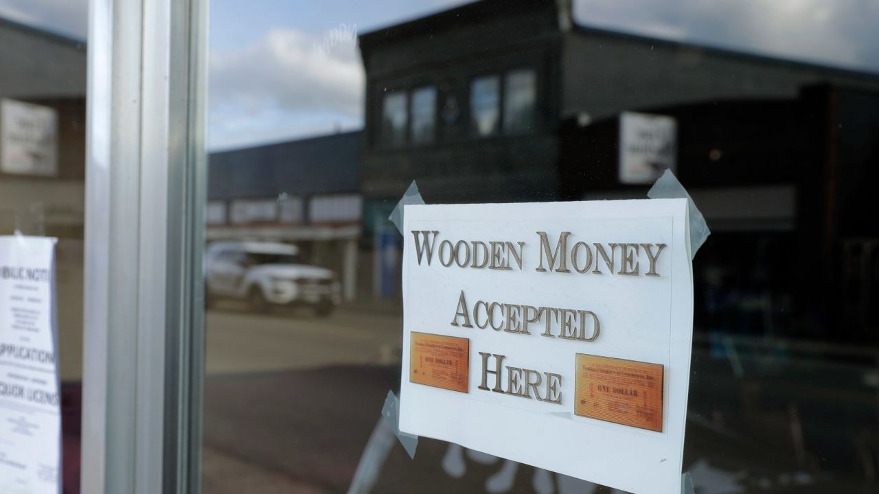 A sign on a business in Tenino, Washington, says they will be accepting wooden money.