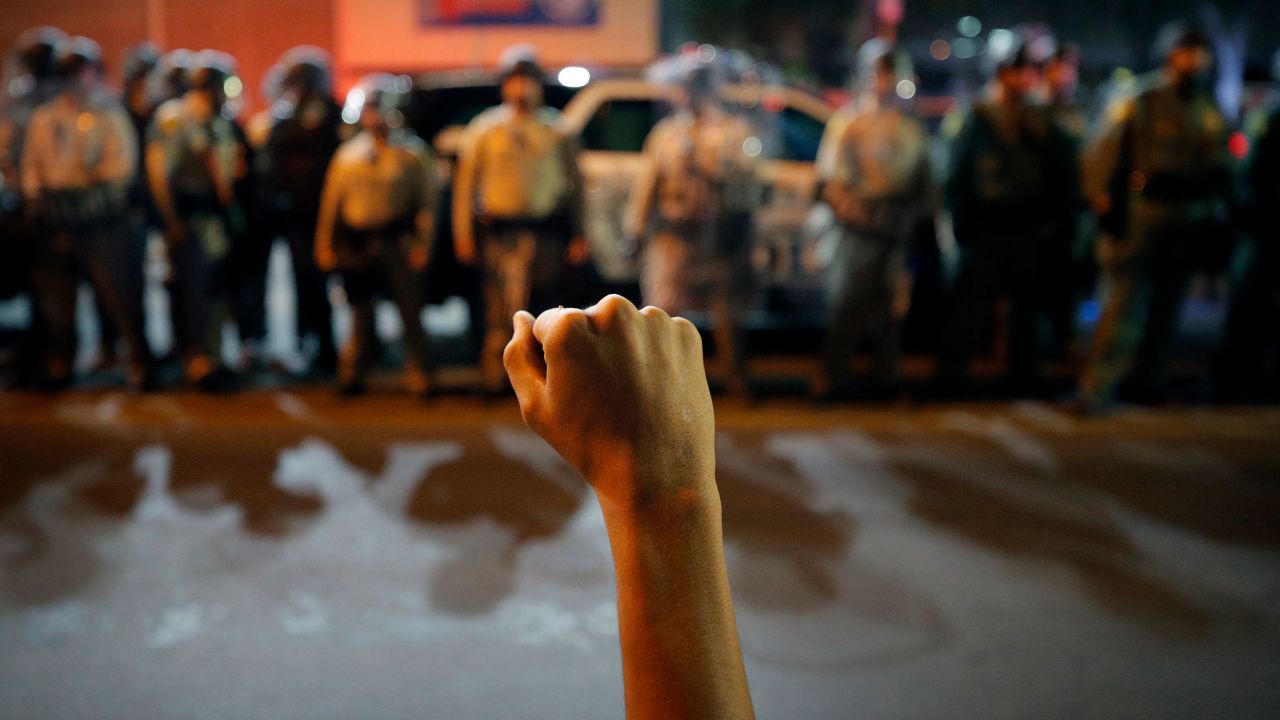 A protester raises his fist during a rally June 1, 2020, in Las Vegas.