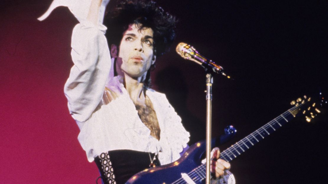 Prince performs in concert with his "Blue Angel" guitar in 1989.