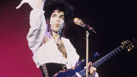 Prince performs in concert with his "Blue Angel" guitar in 1989.