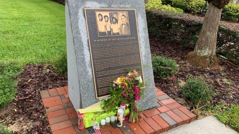 A tribute to George Floyd rests on the memorial erected for the Groveland Four at the Old Lake County
Courthouse.