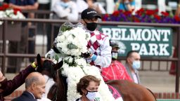 Jockey Manuel Franco celebrates atop Tiz the Law after winning the 152nd running of the Belmont Stakes.
