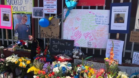 A memorial was set up in front of Gardena auto body shop where Andres Guardado was killed.