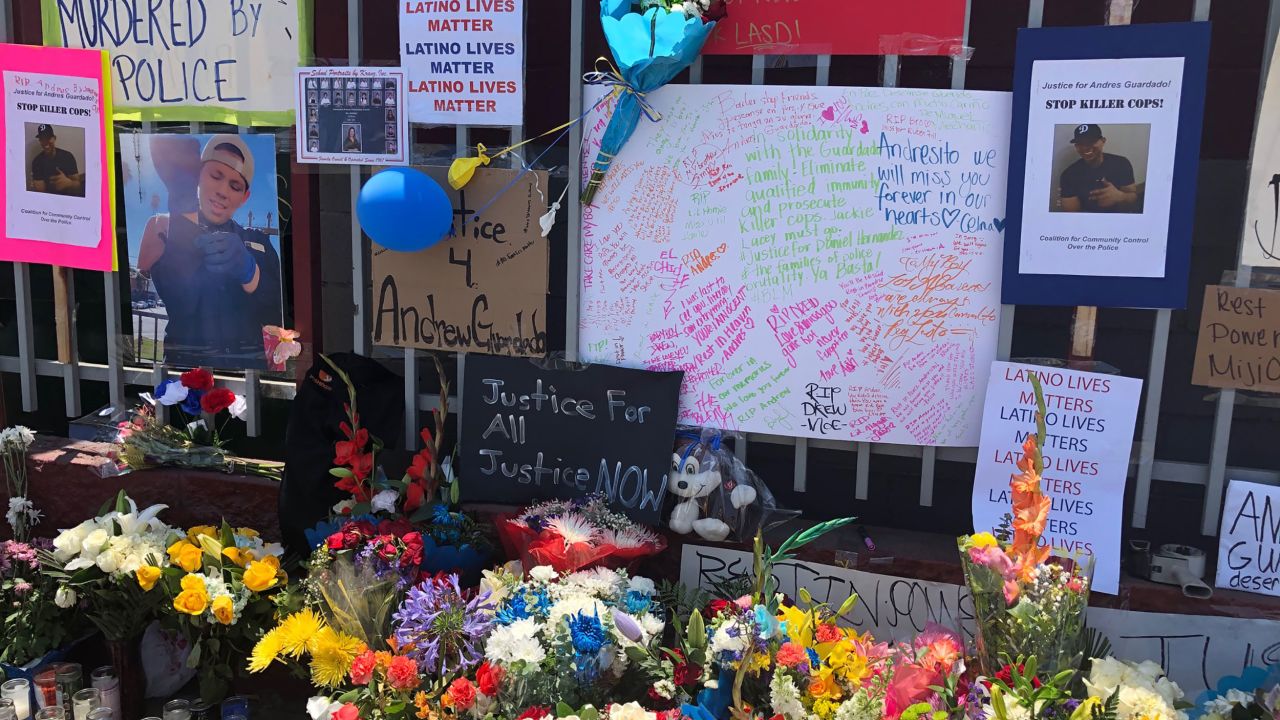 A memorial has formed outside the body shop where Andres Guardado was shot and killed by a Los Angeles County Sheriff deputy on Thursday, June 18, 2020.