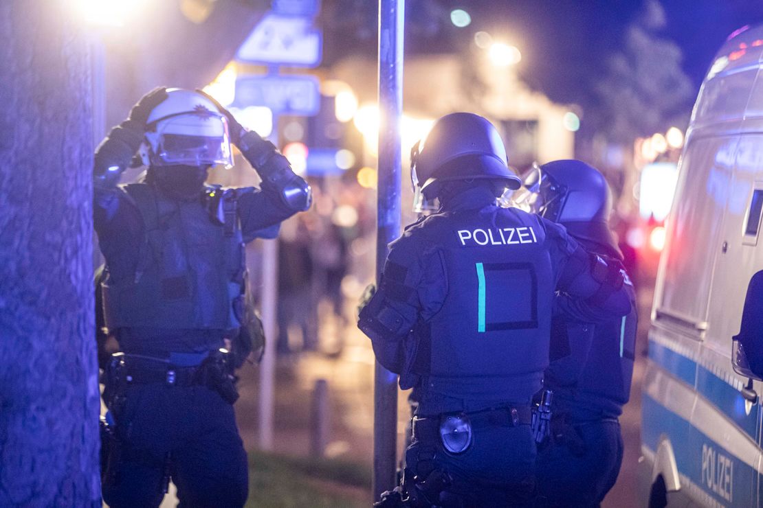 Police officers responding to riots in Stuttgart, Germany.