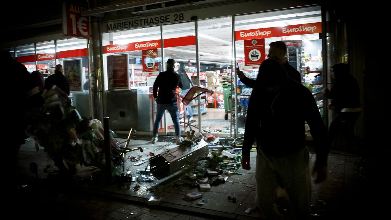 Hundreds of rioters in small groups looted stores and clashed with police in Stuttgart.
