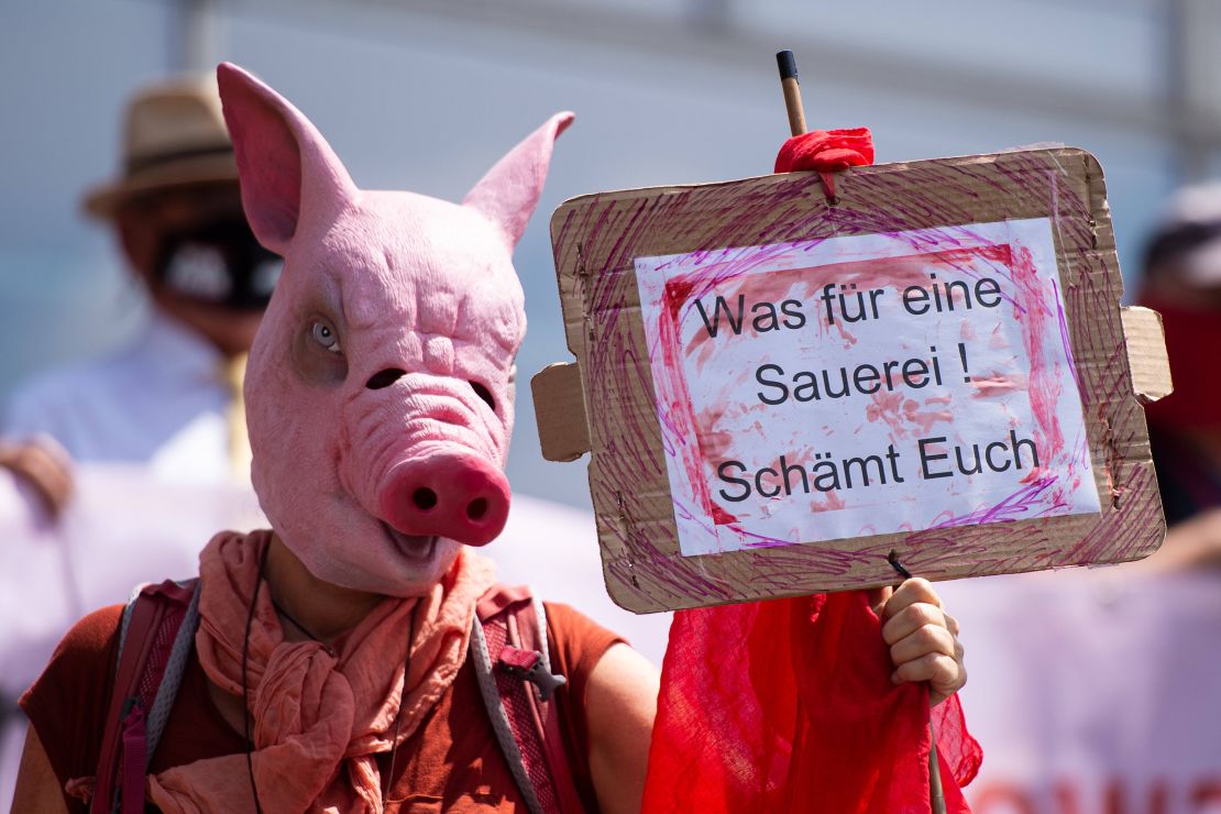 A demonstration at a news conference over the outbreak at Toennies meat processing plant in Guetersloh.