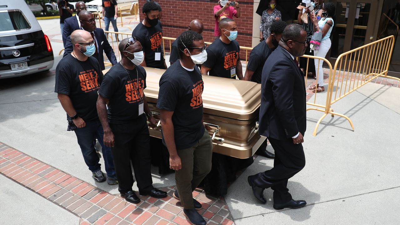Pallbearers bring the remains of Rayshard Brooks into the Ebenezer Baptist Church for his viewing.