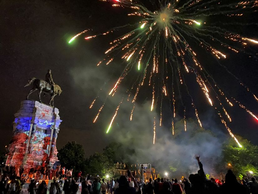 Fireworks explode over the statue of Confederate General Robert E. Lee during a Juneteenth celebration in Richmond, Virginia, on June 19. <a href="https://www.cnn.com/2020/06/11/us/what-is-juneteenth-trnd/index.html" target="_blank">The Juneteenth holiday</a> commemorates the end of slavery in the United States.