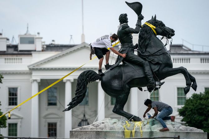 Protesters near the White House <a href="index.php?page=&url=https%3A%2F%2Fwww.cnn.com%2F2020%2F06%2F22%2Fpolitics%2Fwhite-house-secret-service-press%2Findex.html" target="_blank">try to pull down a statue</a> of former President Andrew Jackson on June 22. The statue stands in the middle of Lafayette Square, which has been the site of largely peaceful protests.