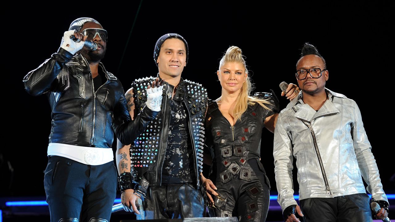 Will.i.am, Taboo, Fergie and Apl.de.Ap of the Black Eyed Peas perform onstage in 2011 at Central Park in New York City.  