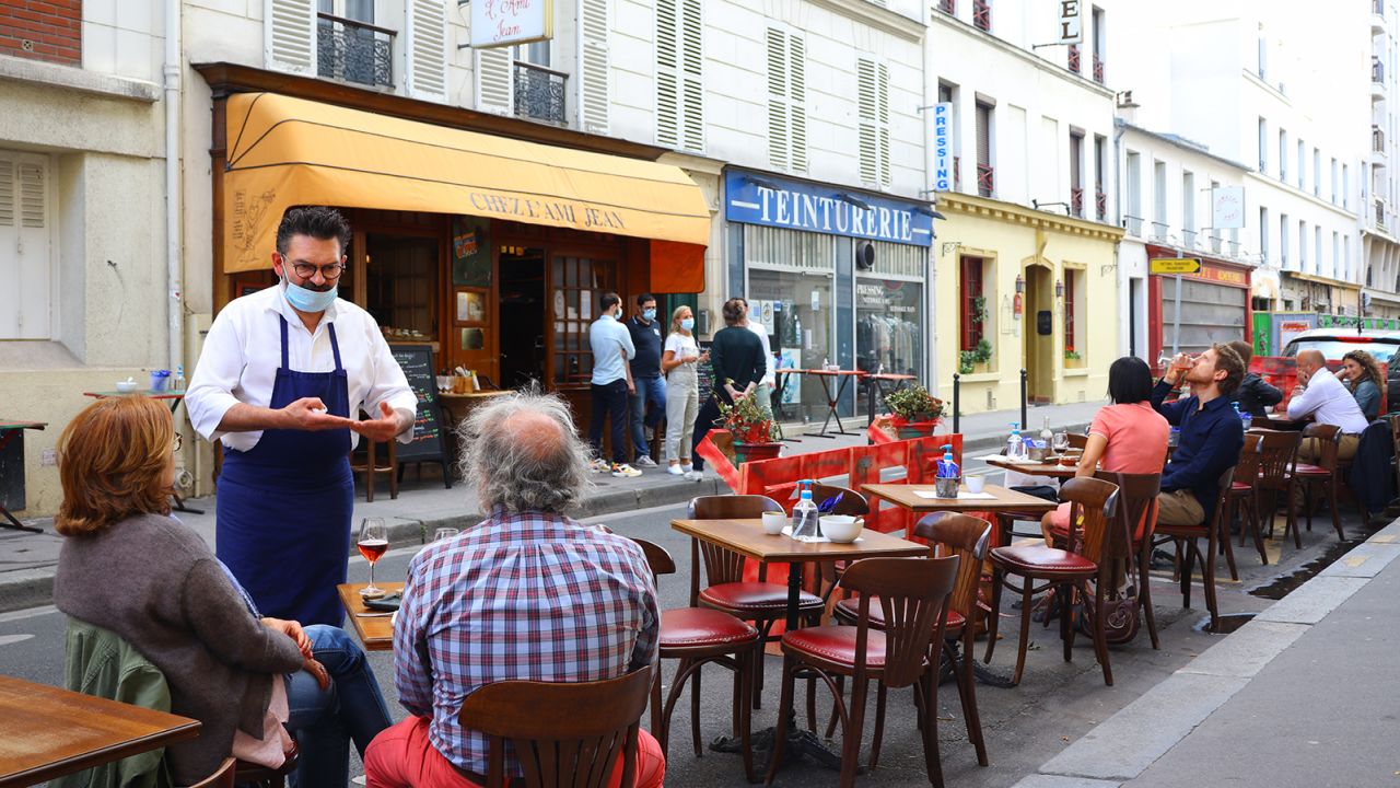 Chez L'Ami Jean has reopened in Paris with new outdoor seatings on a sidewalk.