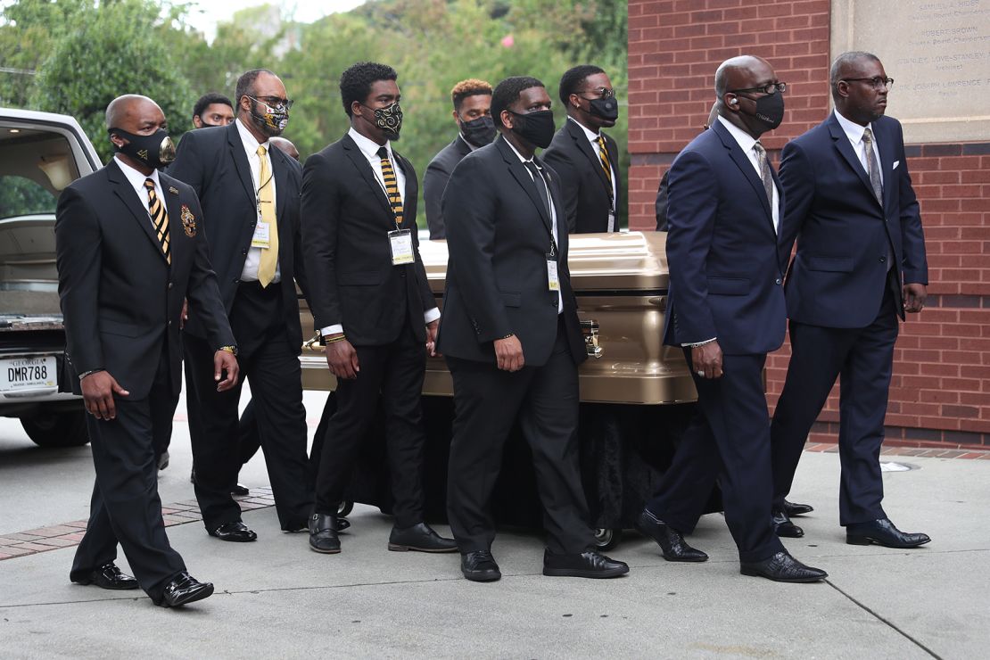 Pallbearers bring Rayshard Brooks to the Ebenezer Baptist Church in Atlanta for his funeral on Monday.