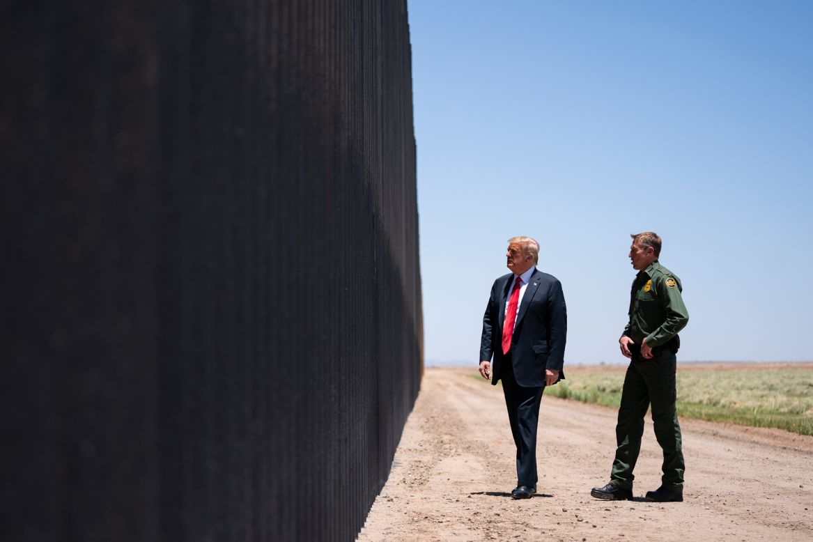 United States Border Patrol Chief Rodney Scott gives President Donald Trump a tour of a border wall in San Luis, Arizona, on Tuesday, June 23. The Trump administration billed <a href="https://www.cnn.com/2020/06/23/politics/trump-us-mexico-border-wall/index.html" target="_blank">Tuesday's trip</a> as a celebration of 200 miles of new wall. Roughly three of those miles have been constructed in areas where no barriers previously existed. The majority of miles replaced old, outdated designs with an enhanced system, according to US Customs and Border Protection.