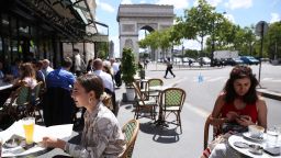 PARIS, June 18, 2020 -- People have lunch at a restaurant near the Arc de Triomphe in Paris, France, June 18, 2020. About 300,000 restaurants and cafes in France reopened after being deserted in the past three months. (Photo by Gao Jing/Xinhua via Getty) (Xinhua/Gao Jing via Getty Images)