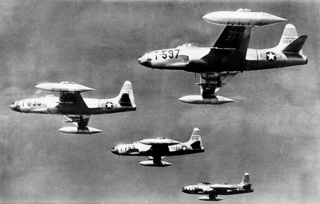 Four F-80 jet fighters flying at 30,000 feet on their flight from a Japanese base to their mission against the North Korean cCommunist army columns, Korea, July 13, 1950.