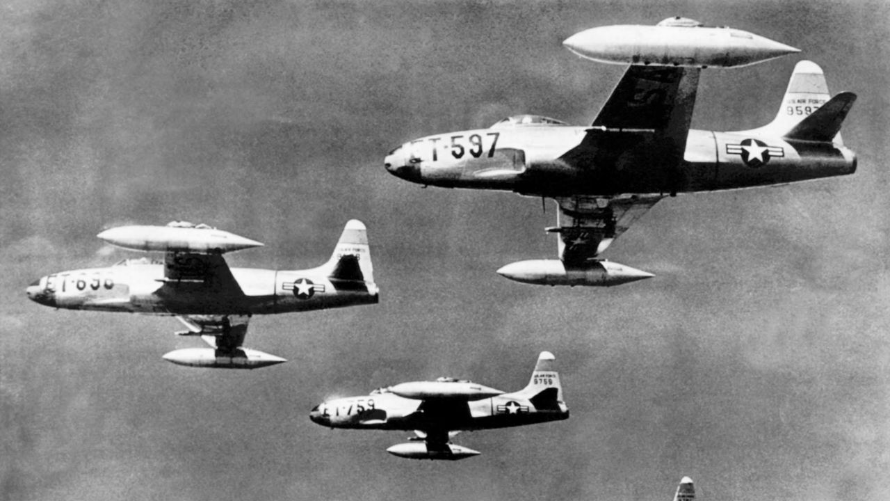 Four F-80 jet fighters flying at 30,000 feet on their flight from a Japanese base to their mission against the North Korean cCommunist army columns, Korea, July 13, 1950.