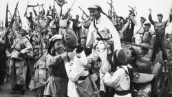 NORTH KOREA - JANUARY 01:  North-Korean and Chinese troops celebrate their shared victory in South Korea after having driven back an attack of American forces in June 1950. In the foreground, women soldiers express their joy. This scene took place around June 25, 1950, when North Korea crossed the 38th parallel and invaded South Korea.  (Photo by Keystone-France/Gamma-Keystone via Getty Images)