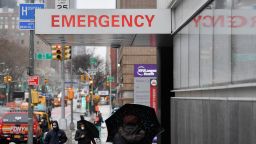 A sign is seen at the NYU Langone Health Center hospital emergency room entrance on March 23, 2020 in New York City. - Anxiety ratcheted up across New York, the epicenter of America's coronavirus pandemic, Monday with streets eerily quiet at the start of the working week as officials warn the crisis will worsen.As the number of deaths in the United States from COVID-19 soars towards 500, the Big Apple finds itself at Ground Zero in the fight to stem the fast-breaking outbreak. (Photo by Angela Weiss / AFP) (Photo by ANGELA WEISS/AFP via Getty Images)