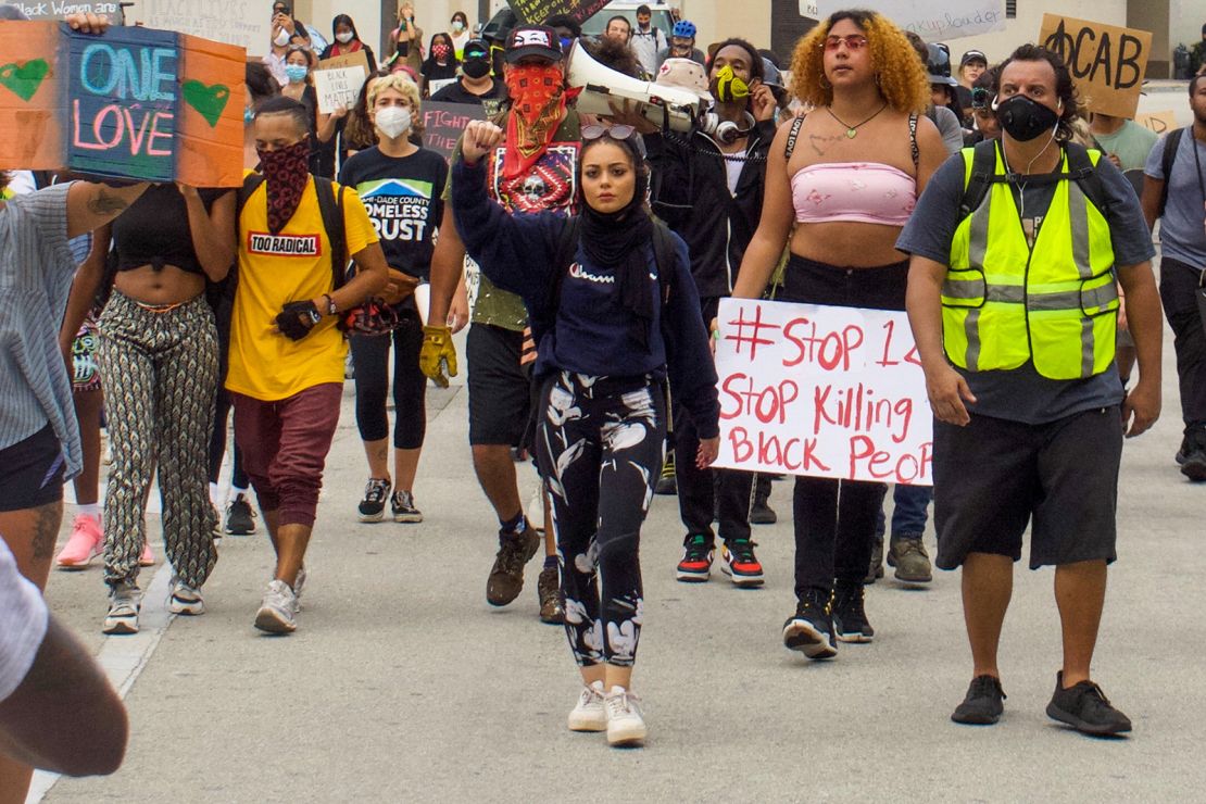 Massri takes part in the Miami protest shortly before her arrest.