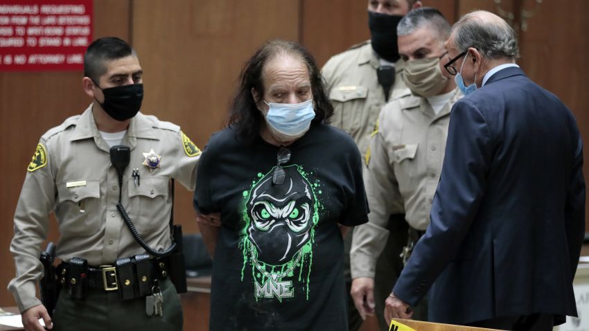 Adult film star Ron Jeremy, second left, with his attorney Stuart Goldfarb, right, makes his first appearance in Dept. 30 at Los Angeles Superior Court in Los Angeles, Tuesday, June 23, 2020. Los Angeles County prosecutors say Jeremy has been charged with raping three women and sexually assaulting a fourth. (Robert Gauthier/Los Angeles Times via AP, Pool)
