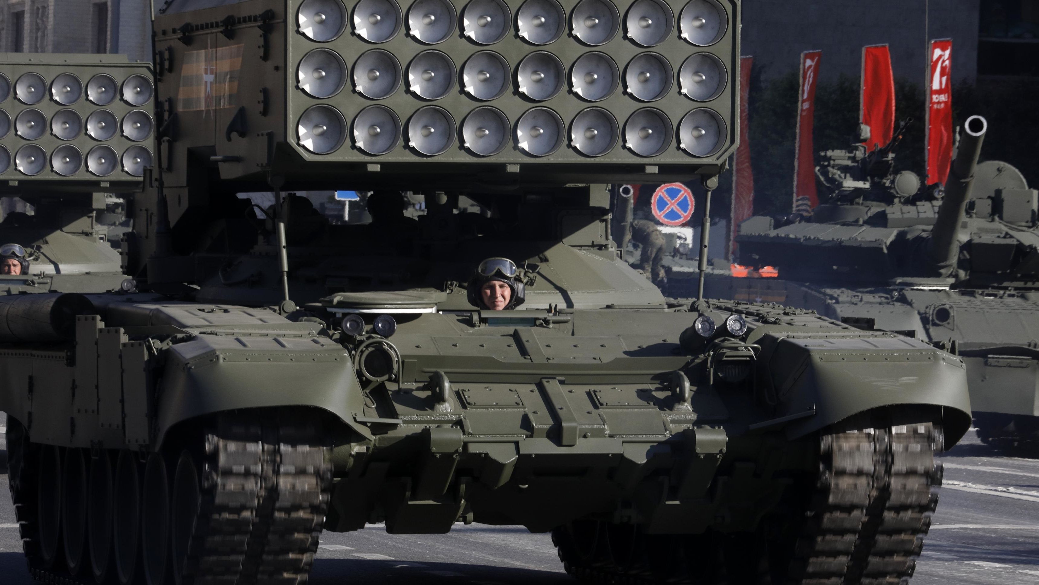 A TOS-1A Buratino multiple rocket launcher moves along Tverskaya Street ahead of the military parade in Red Square.