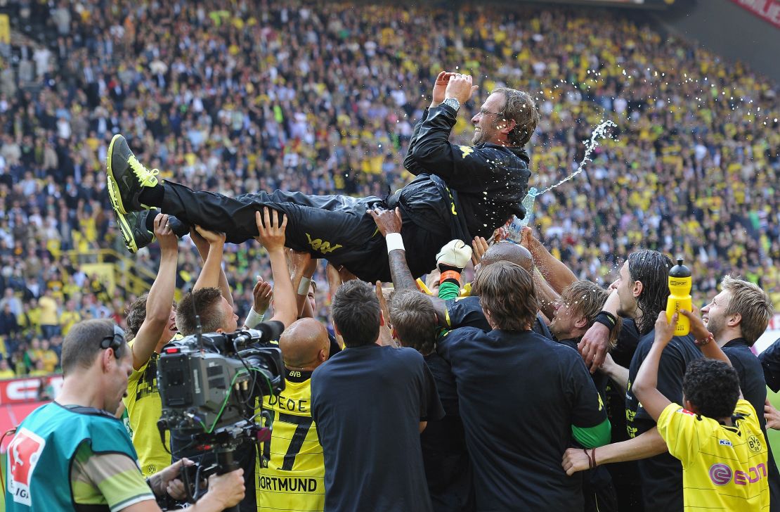 Klopp is tossed in the air by his players after winning the league title at the end of the Bundesliga match between Dortmund and FC Nuernberg on April 30, 2011.