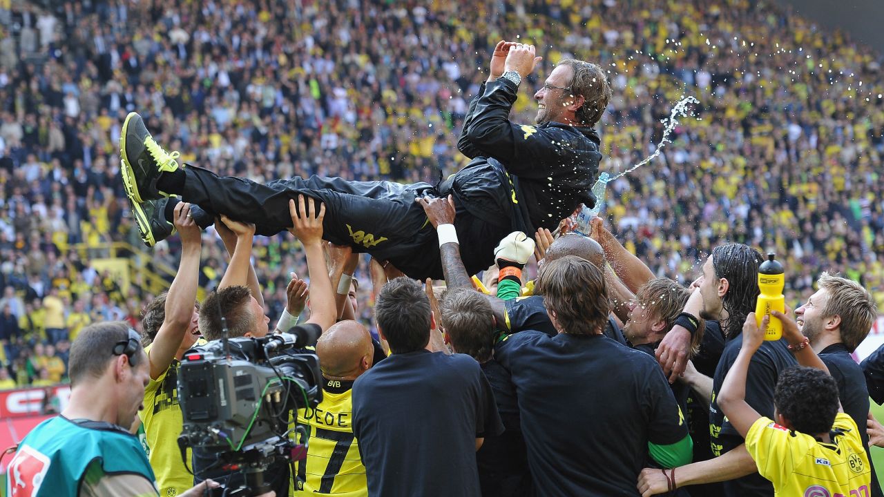 Klopp is tossed in the air by his players after winning the league title at the end of the Bundesliga match between Dortmund and FC Nuernberg on April 30, 2011.
