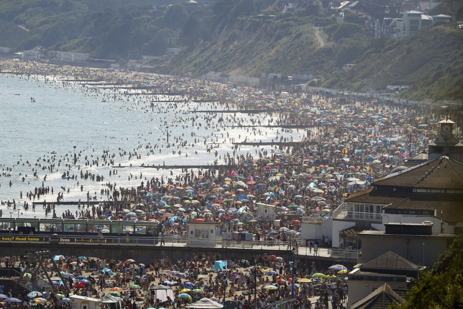 A beach is slammed with people in Bournemouth, England, on June 24. British Prime Minister Boris Johnson <a  target="_blank">began easing coronavirus restrictions in May,</a> but people are still supposed to be distancing themselves from one another.