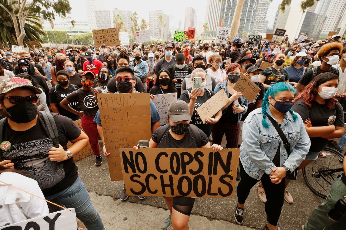 Students and community members gathered outside the Los Angeles Unified School District urging officials to defund its school police.